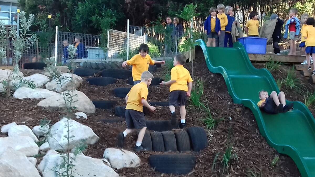 Kiama Public School students enjoy playing in their new nature-based play space.