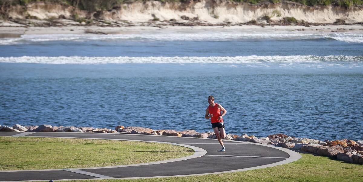 RUN COMES TO KIAMA: A competitor taking part in the Huskisson Coastal Classic. The inaugural Kiama Coastal Classic will be held on July 10. Elite Energy Events are running the event.  