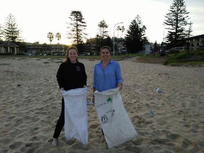 PLASTIC FREE: Kiama's Sarah McGuinness and Jasmine Bell encourage everyone to join in on a clean up of Surf Beach, Kiama on July 29. 
