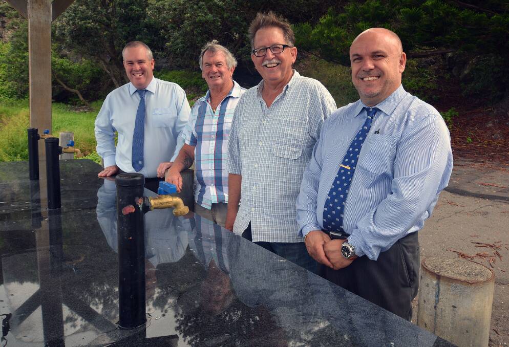 NEW TABLE: Jason Stalgis (Gerringong Hotel Fishing Club), councillors Mark Way and Mark Westhoff with Gino Belsito (director of Engineering and Works). Picture: Supplied