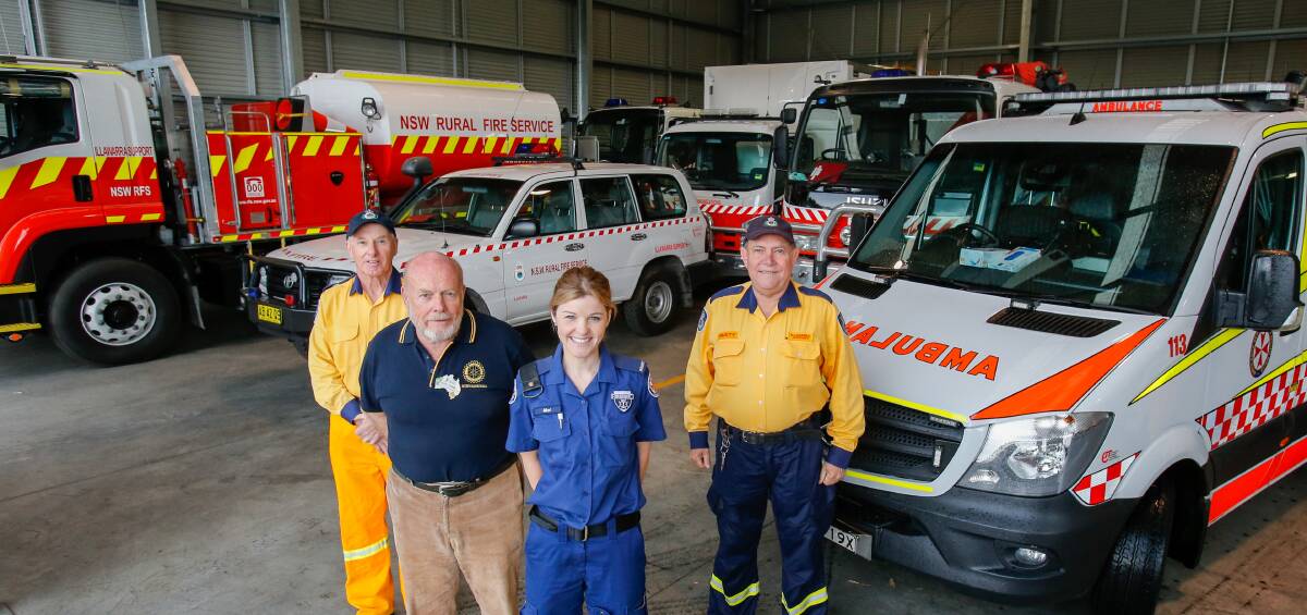 EXPO: RFS volunteer Tom Conboy with David Ferne from the Rotary Club of Minnamurra, paramedic Mel Bokenham and Rusty Shore from the RFS. Picture: Adam McLean