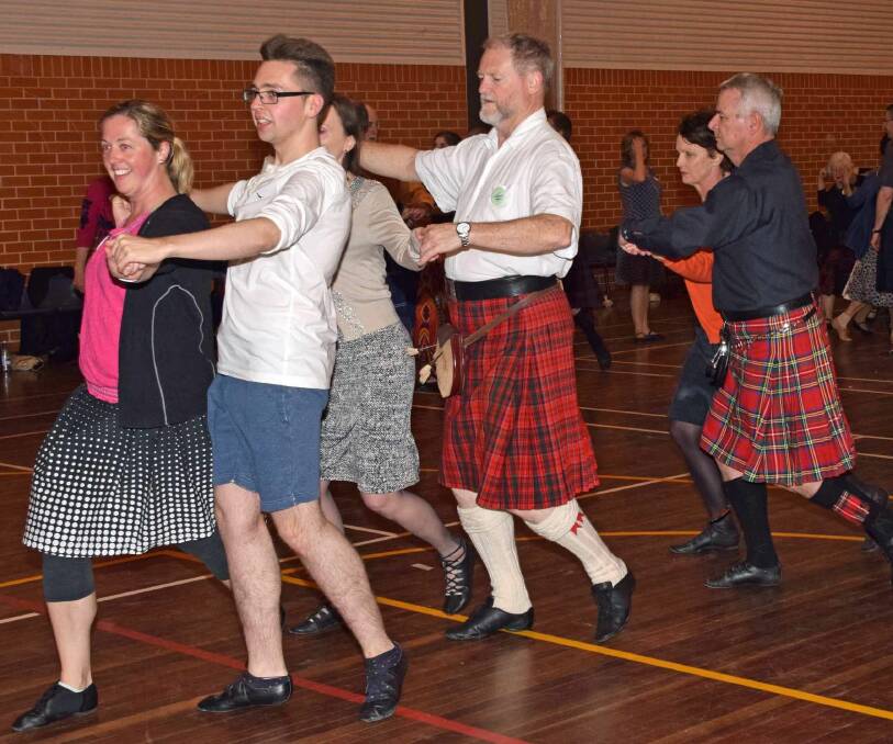 FESTIVAL SPIRIT: Participants enjoying the Kiama celebrations. For further details on Scottish Country Dancing, visit the www.rscds.org.au website. Picture: Supplied