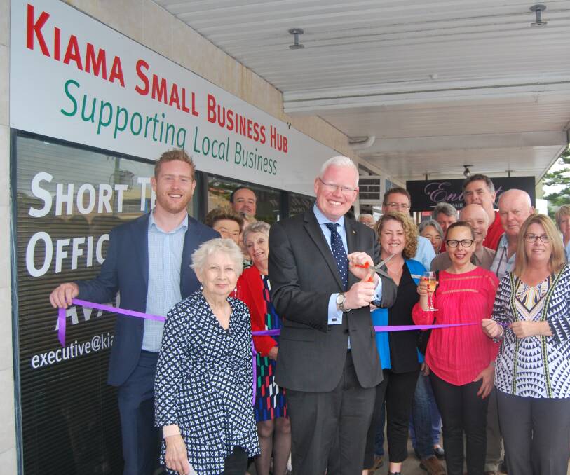 CUTTING THE RIBBON: Kiama MP Gareth Ward, chamber members and business-people at the launch of the new small business hub on Friday. Picture: HAYLEY WARDEN