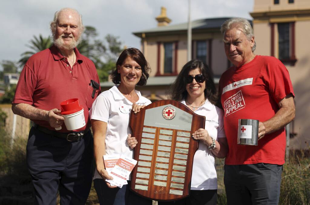 The Kiama Branch of the Red Cross in 2015, celebrating recognition of their efforts in the Red Cross Calling campaign. 