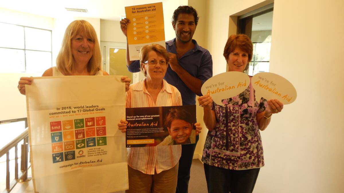 Local supporters of the Australian Aid Campaign, (left to right) Margaret Boothroyd, Jenny Dundas, Dianne Avery with Gershon Ninbalker, advocacy manager, Baptist World Aid Australia. 