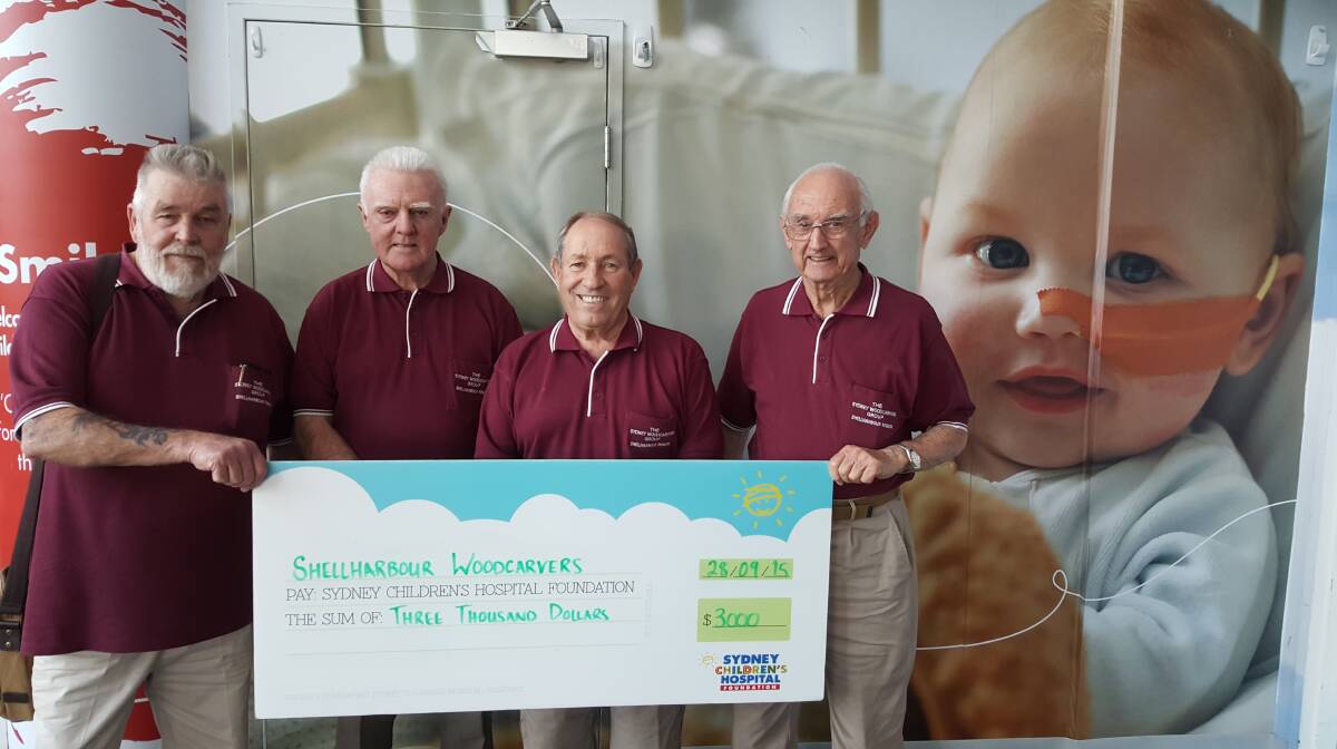 VALUABLE DONATION: Shellharbour Woodcarvers members (left to right) Ted Furlong, Jim Balmain, Frank O’Connor and Kevin Gillis. Picture: SUPPLIED