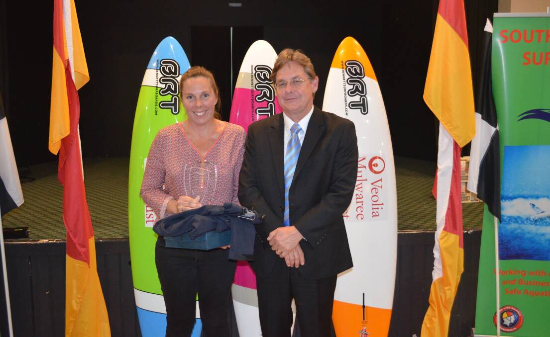 WINNER: Naida Guy of Kiama Downs SLSC with Surf Life Saving NSW president David Murray. Picture: Supplied