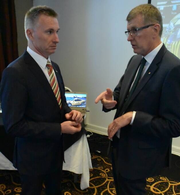 NETWORK MEETING: Roy Wakelin-King (left) and John Watkins during the chamber event at Kiama last week. Picture: BRENDAN CRABB