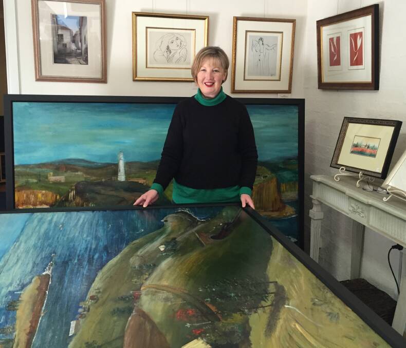 Andrea Hope from Kiama Art Gallery finalising the framing of the artworks.