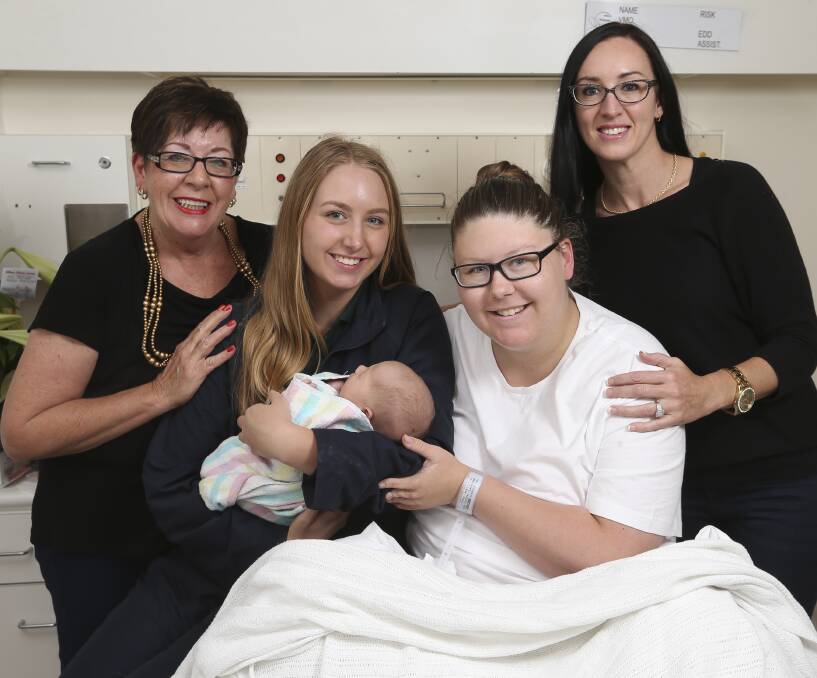 BIZARRE BIRTHDAY: Raylee Crompton, Bella Medcraft ,16, holding baby Flynn Fawcett, with Millie Medcraft and Nykarla Chambers. All but Millie were born on May 3. Picture: ELENOR TEDENBORG