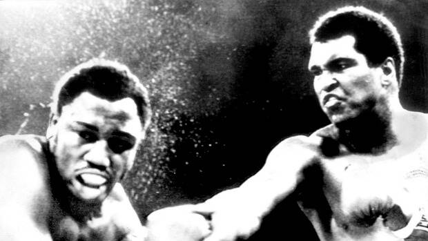 Muhammad Ali and Joe Frazier fight in Manila, October 1975. 