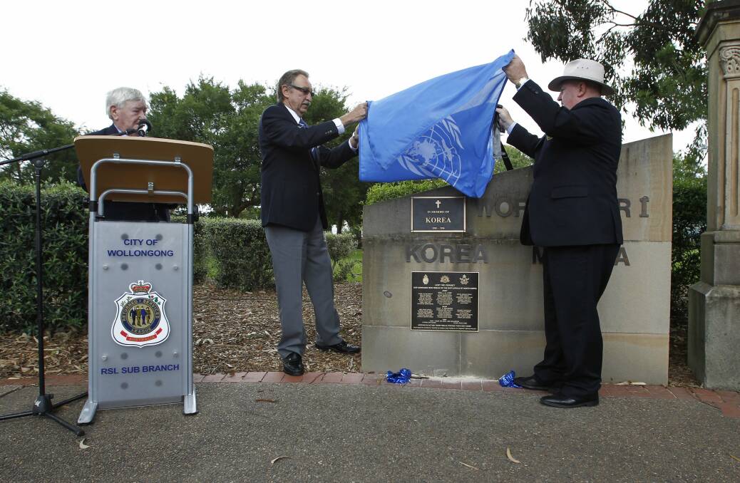 Warwick Hansen (right) in 2011 at the dedication of a plaque to those missing in action from the Korean war. Picture: Andy Zakeli