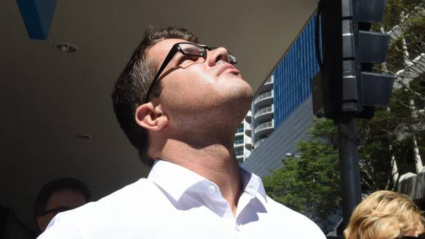 Gable Tostee looks to the sky during his trial for murder at the Brisbane Supreme Court. Photo: AAP

