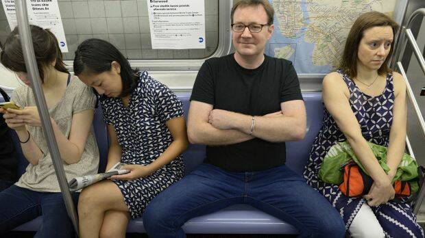 Women crowded by manspreading is an international problem.  Photo: Richard Yeh / WNYC

