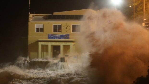 Coogee Surf Life Saving Clubhouse hit by massive waves during the storm. Photo: Peter Rae