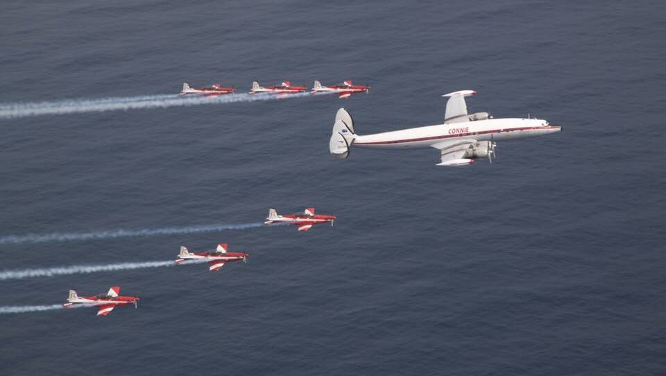 The Air Force Roulettes fly in formation with 'Connie' - the Historic Aircraft Restoration Society's Super Constellation. Photo: Facebook