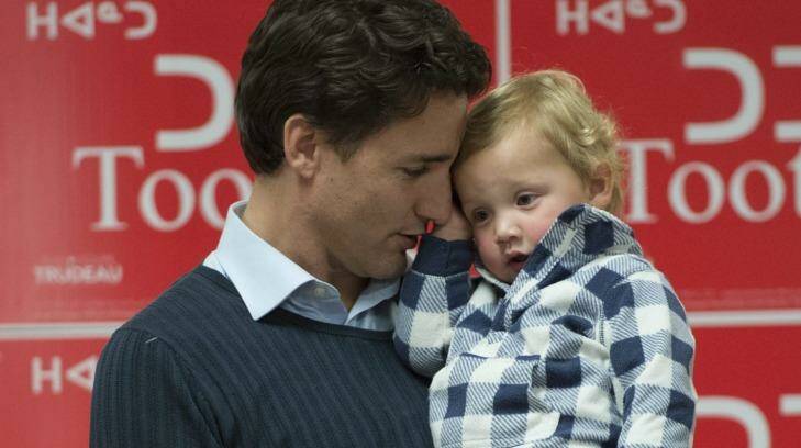 Trudeau holds his son Hadrien during a campaign event in Iqaluit, Nunavut. Photo: Paul Chiasson