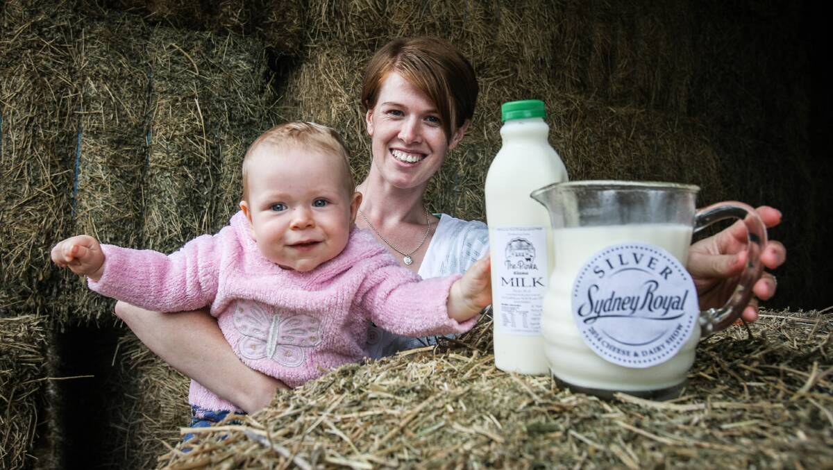 Mahlah Grey and daughter Tabitha show off their prize-winning milk. Picture: DYLAN ROBINSON