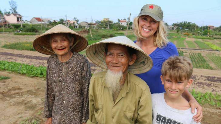 Happy tourists: Tracey Spicer and her son loved travelling through Vietnam and meeting locals. Photo: Jason Thompson