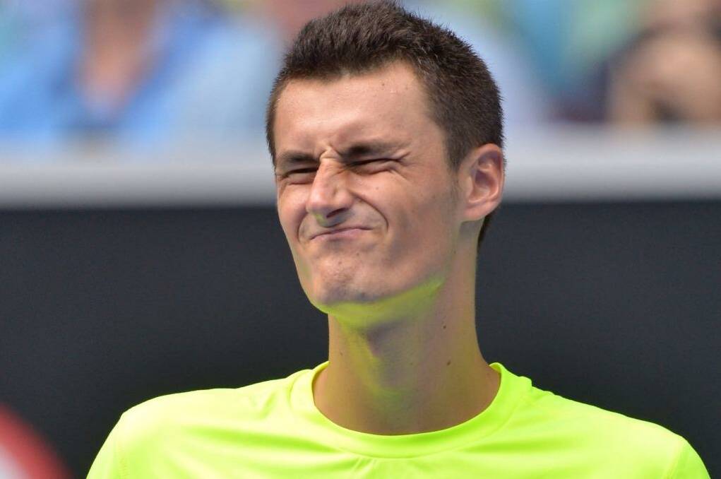 Tame exit: Bernard Tomic reacts during his match against Tomas Berdych. Photo: Joe Armao