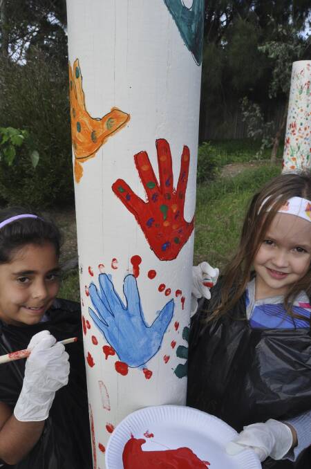 FACE group members Dakota Callaghan, 8, and Lauren Jukes, 6, take part in a reconciliation event held by Access Community Group.