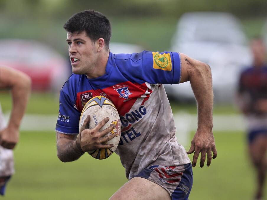 One of their best on Sunday, Gerringong Lions winger Taylor Hudson finds some open space during his side's 16-12 loss to Shellharbour City Sharks at a rain-soaked Ron Costello Oval on Sunday. Picture: DAVID HALL