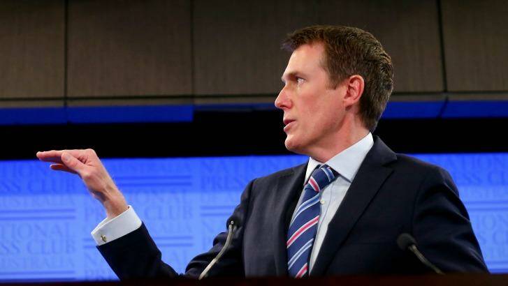 Minister for Social Services Christian Porter addresses the National Press Club of Australia in Canberra on Tuesday. Photo: Alex Ellinghausen