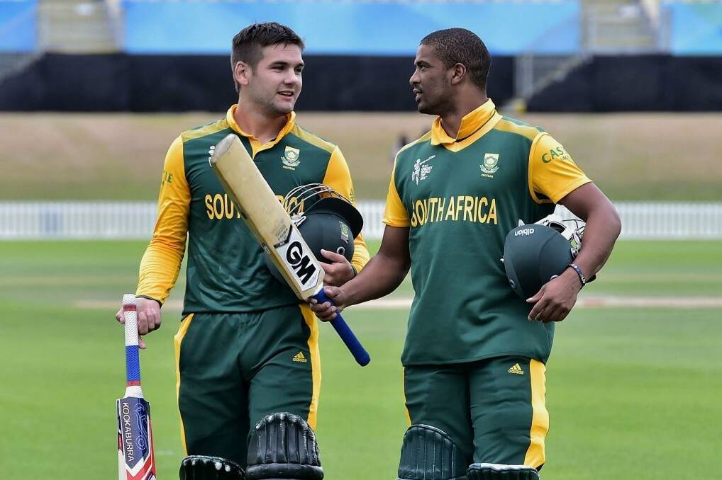 South Africa's Rilee Rossouw (L) and Vernon Philander walk from the field after winning their warm-up game against Sri Lanka. Photo: Marty Melville