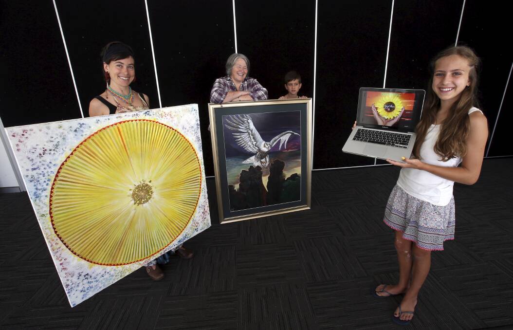 Artist Shining Rainbow (left), Salvation Army First Floor's Marilyn Dunn and Jayne Wilson's grandson Caleb Flemming, 11, with Jayne's painting, and grand-daughter Casey Flemming, 13. Picture: KIRK GILMOUR