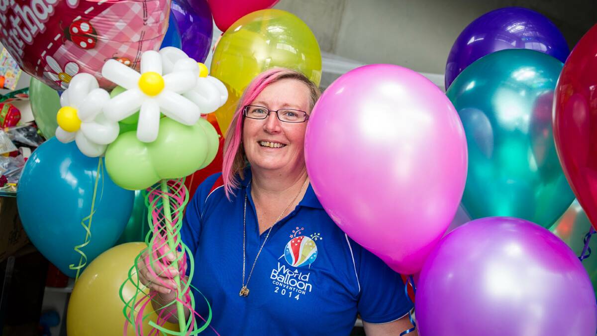 Amanda Griffiths from Barrack Heights will show off her balloon modelling skills when she flies to the US for the World Balloon Convention later this month. Picture: ALBEY BOND