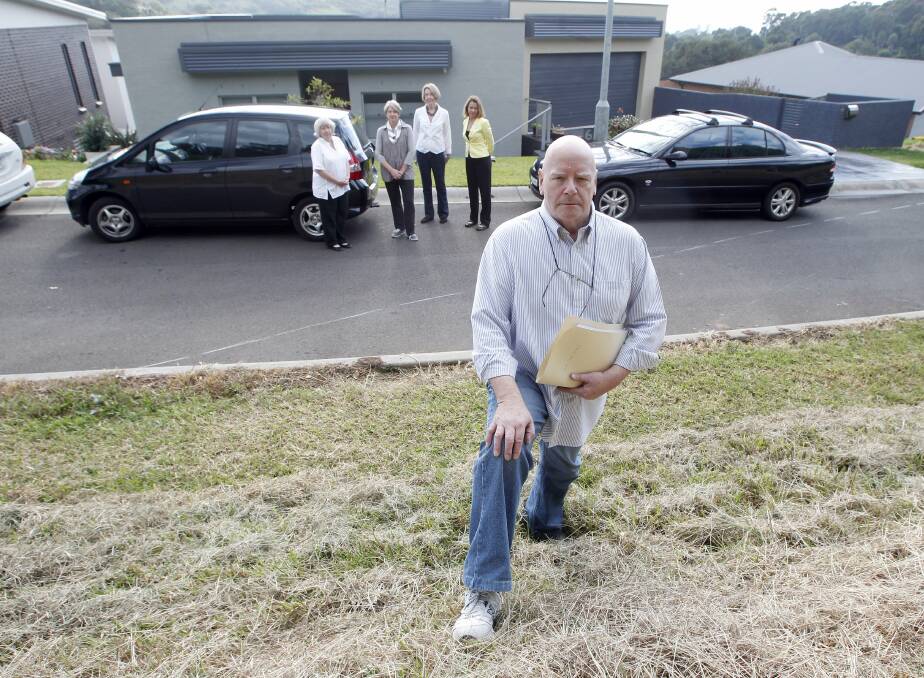 Mike Yalden (front) with fellow Kiama residents concerned about the proposed development. Picture: ANDY ZAKELI