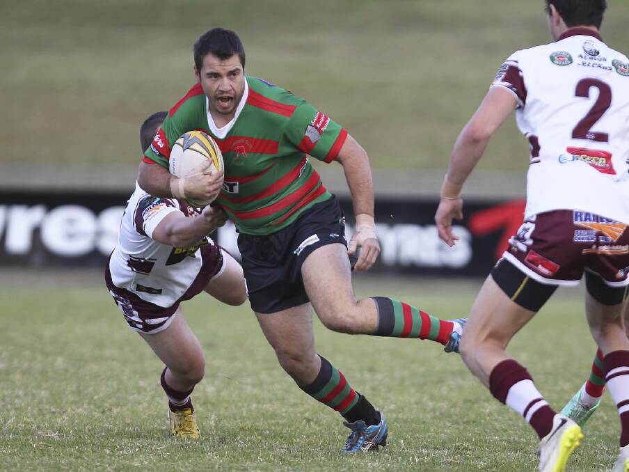 Jamberoo Superoos second-rower Robbie Noble gets around one defender and sizes up the Albion Park-Oak Flats Eagles defence during his side's 36-12 win at Centenary Field on Sunday. Picture: DAVID HALL