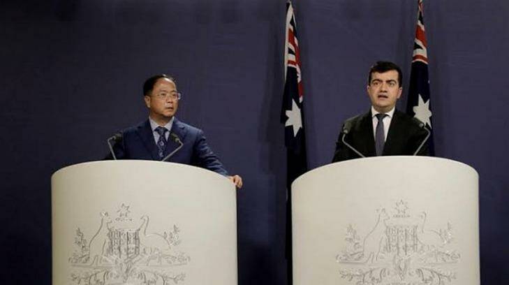 Yuhu Group chief executive Huang Xiangmo and Sam Dastyari at a press conference for the Chinese community in Sydney in June. Photo: Supplied