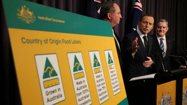Prime Minister Tony Abbott Agriculture minister Barnaby Joyce and Industry minister Ian Macfarlane announce new labels. Photo: Andrew Meares