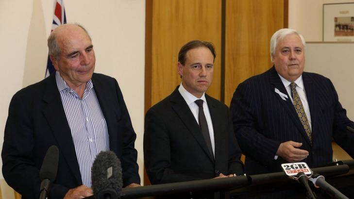 Environment Minister Greg Hunt with Bernie Fraser, left, and Clive Palmer, right.  Photo: Andrew Meares