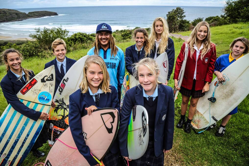Pines Surf Schools co-ordinator Vaya Phrachanh, with Kate Pappas, Max Bullen, Tahlia Collinge, Maddie Tully, Sophie Pappas, Sharn Bourne, Tiahna Cuttanach and Harry Smith all from Shellharbour Anglican College, Warilla High School and Corpus Christi High School prior to this week's annual schools event at Killalea. Picture: GEORGIA MATTS