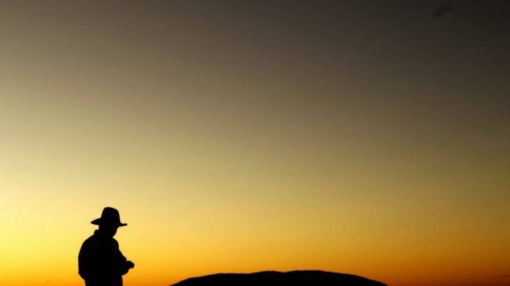 Sunrise at the World Heritage-listed Uluru more than rewards an early start. Photo: Steven Siewert 