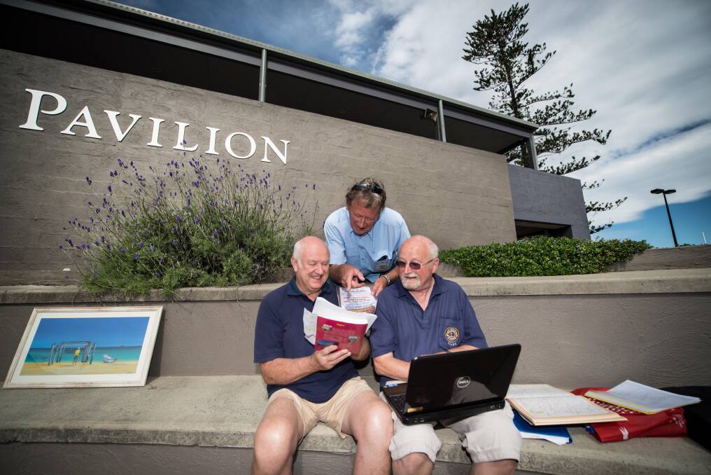 Studying hard for the Kiama Lions Trivia Night, Jerry Granger-Holcombe, Ian Chellew and Bob Gray are hoping to make the night on May 30 a resounding success. Picture: ALBEY BOND