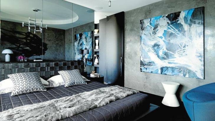 Natale chooses a more dramatic blue-grey palette  for this Elizabeth Bay apartment. Photo: Bill Farr