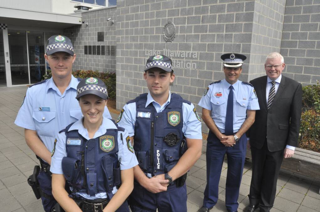 New probationary constables Steven Uglow (Corrimal), Ariann Fernie (Dapto) and Tim Allman (Bellambi) join Kiama MP Gareth Ward and Lake Illawarra Local Area Command Acting Superintendent Andrew Koutsoufis during their induction into the police force. Picture: ELIZA WINKLER