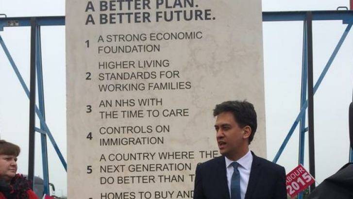 Be careful what you pose for: Ed Miliband with the 'tombstone' of pledges. Photo: Twitter