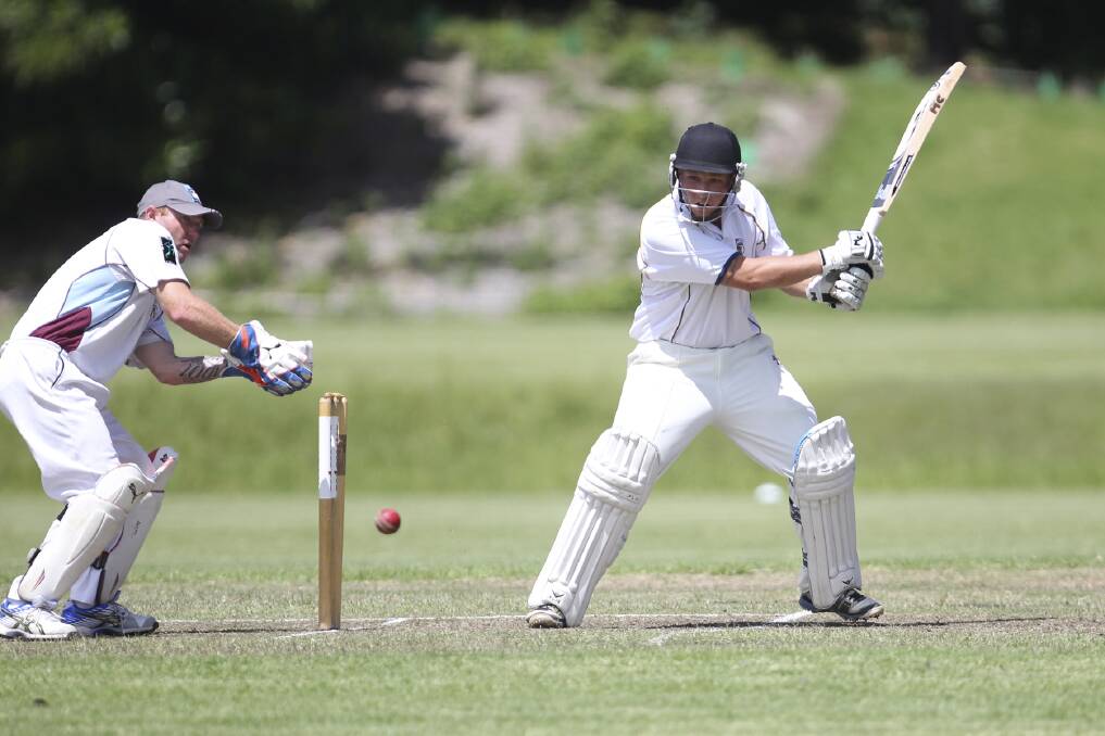 Kiama batsman Lane Tutty plays a cut shot during his side's strong showing against Warilla Kookas at Cavalier Park on Saturday. Picture: DAVID HALL