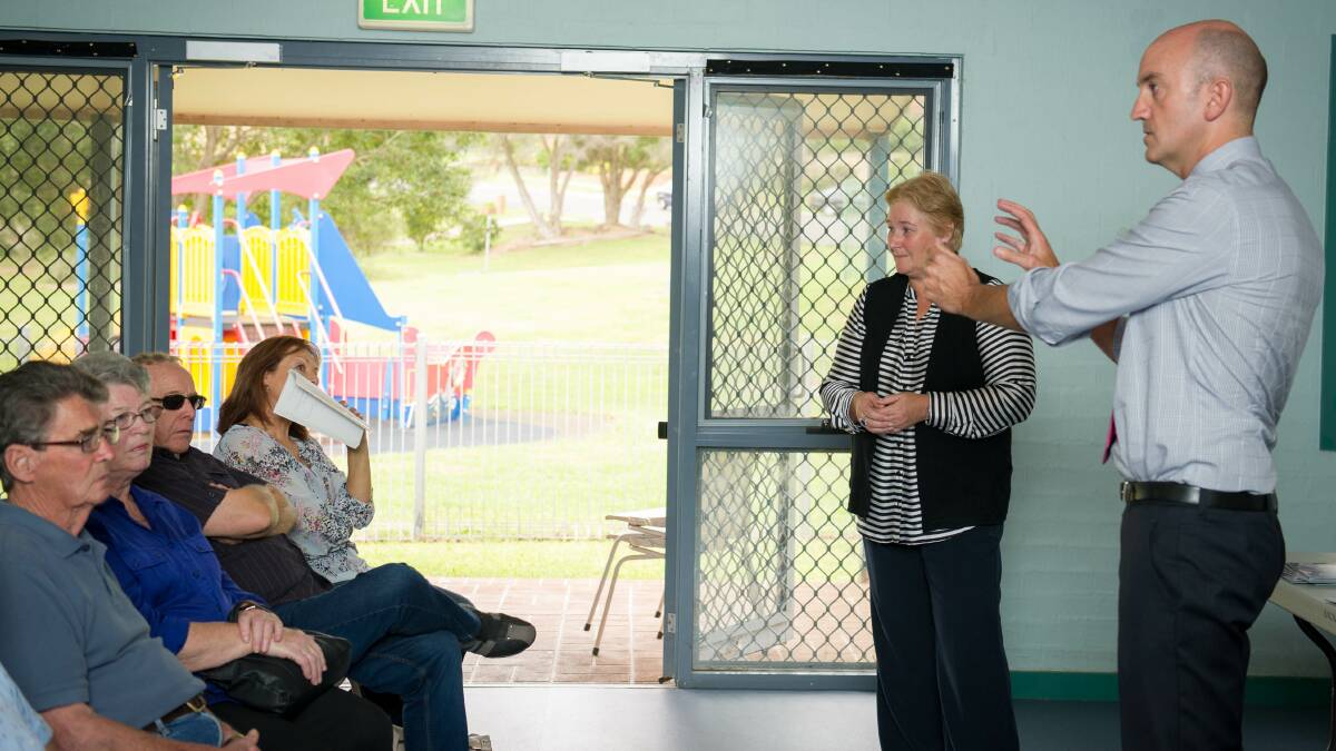 NBN spokesman Tony Gibbs and Gilmore MP Ann Sudmalis talk to residents about the impending switch to the NBN and the subsequent closure of copper-based services. Picture: ALBEY BOND