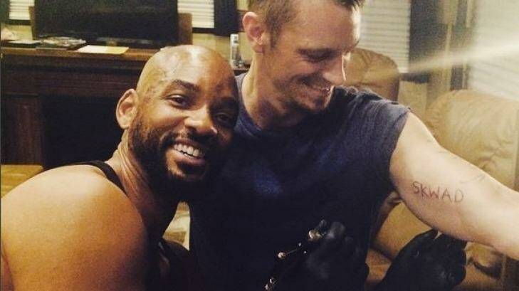 Will Smith tattooing his <i>Suicide Squad</i> cast mate Joel Kinnaman. Photo: Instagram
