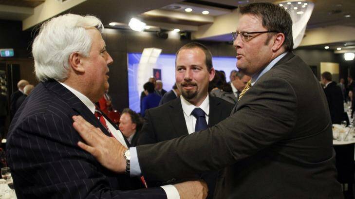 Happier times: Glenn Lazarus with Clive Palmer and Motoriing Enthusiast senator Ricky Muir in 2013.  Photo: Andrew Meares
