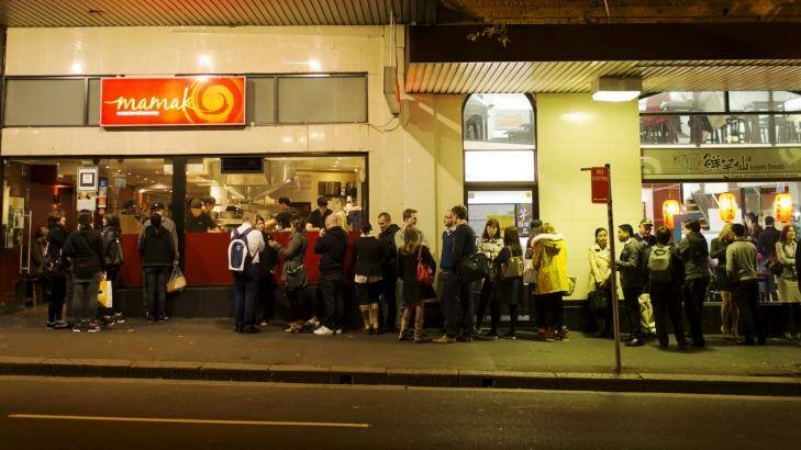 People queuing up to enter Mamak restaurant in Haymarket.  Photo: James Brickwood