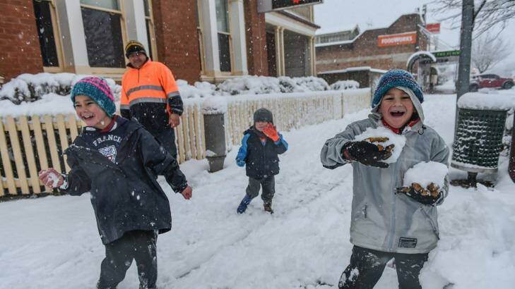 Fun in the snow as Oberon children stay home from school and play after the heaviest snowfall in around 40 years. Photo: Brendan Esposito