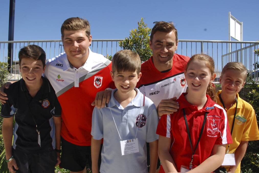 Matt Cordell from Ss Peter and Paul Kiama, with St George Illawarra Dragons Blake Lawrie, Caleb Flemming from Nazareth, St George Illawarra Dragons Adam Bezzina, Cara Moon from St Paul's Albion Park and Ben Puljak from Stella Maris Shellharbour. Picture Eliza Winkler