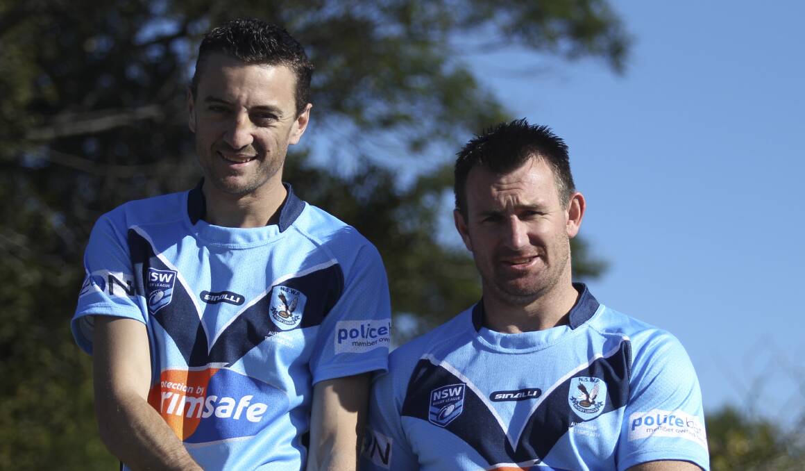 Liam Watson and Sean Jenkins played their part in helping NSW Police down Queensland during their annual clash in Brisbane. Picture: DAVID HALL