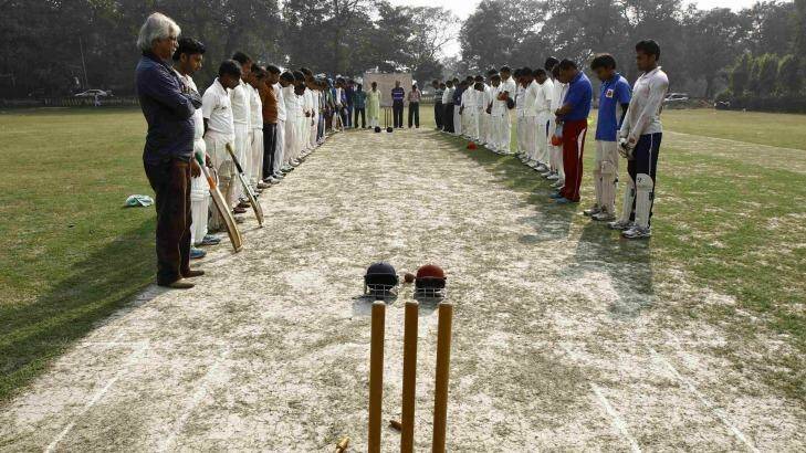 Indian players observing a moment of silence before a match in Kolkata.